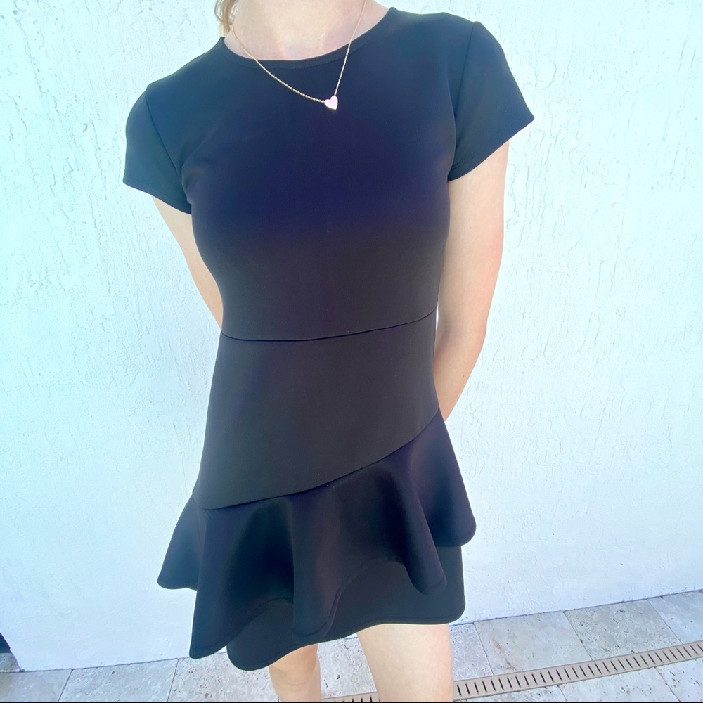 BCBGirls black mini dress size 10. 28inches long.Worn once, excellent condition.